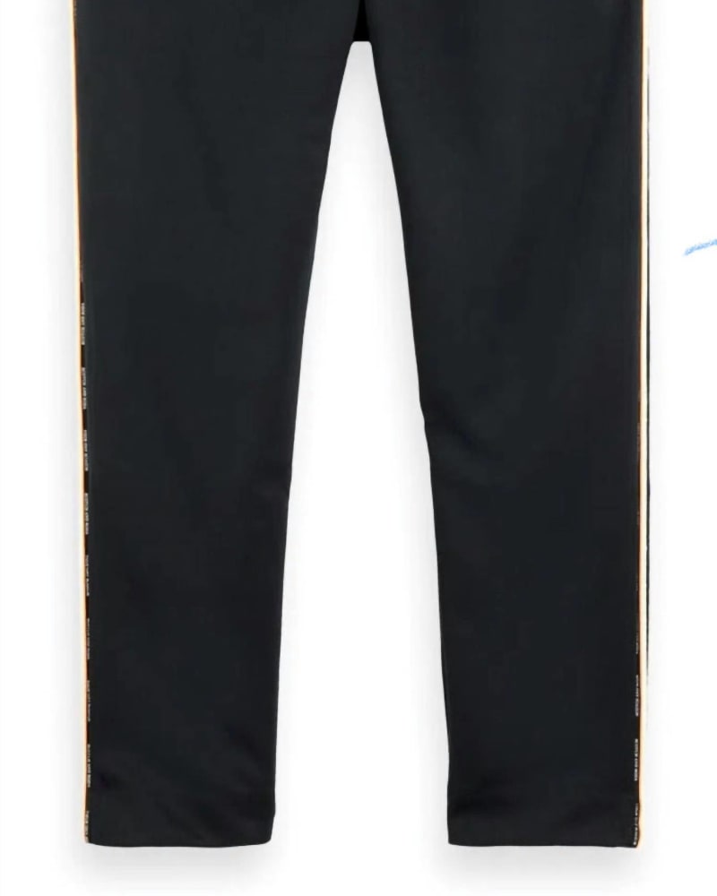 Front of a size L Logo Tape Sweatpants in Black in Black by SCOTCH & SODA. | dia_product_style_image_id:338060